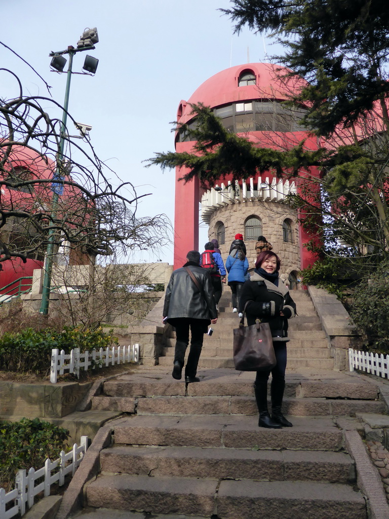 Miaomiao at the entrance gate to the sightseeing towers at the Xinhaoshan Park