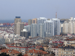 The northwest side of the city with skyscrapers, the harbour and Jiaozhou Bay, viewed from the rotating sightseeing tower at the Xinhaoshan Park