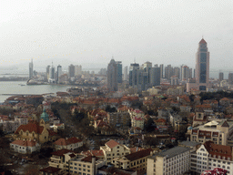 The city center with skyscrapers and the Qingdao Protestant Church, Qingdao Bay and the skyscrapers and dome at the west side of the city, viewed from the rotating sightseeing tower at the Xinhaoshan Park