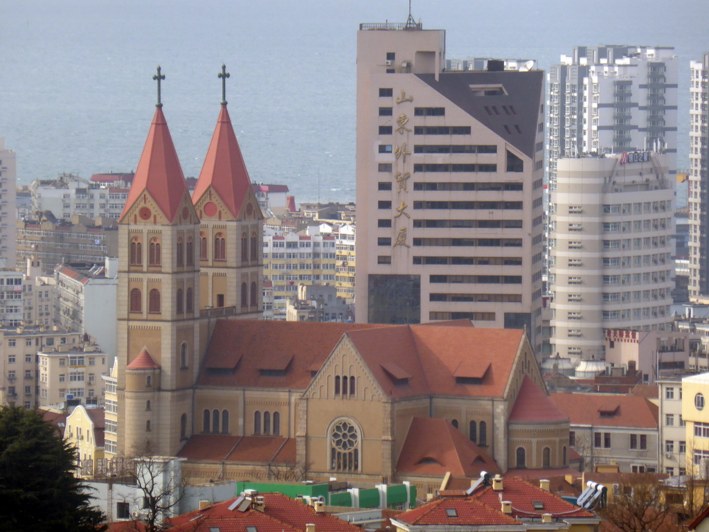 St. Michael`s Cathedral and surroundings and Jiaozhou Bay, viewed from the rotating sightseeing tower at the Xinhaoshan Park