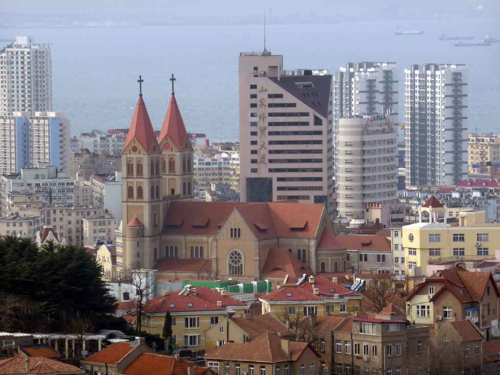 St. Michael`s Cathedral and surroundings and Jiaozhou Bay, viewed from the rotating sightseeing tower at the Xinhaoshan Park