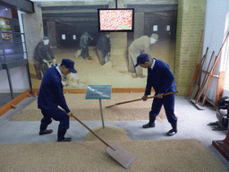 Wax statues working on floor malting, at the Tsingtao Beer Museum