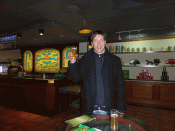 Tim with a Tsingtao beer at a bar in the Tsingtao Beer Museum