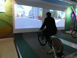 Tim on a bike doing a virtual tour through Qingdao, at the Tsingtao Beer Museum