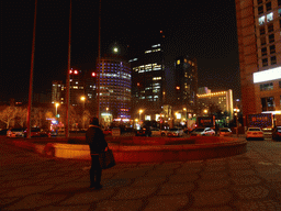 Miaomiao at the square in front of the World Trade Center, by night