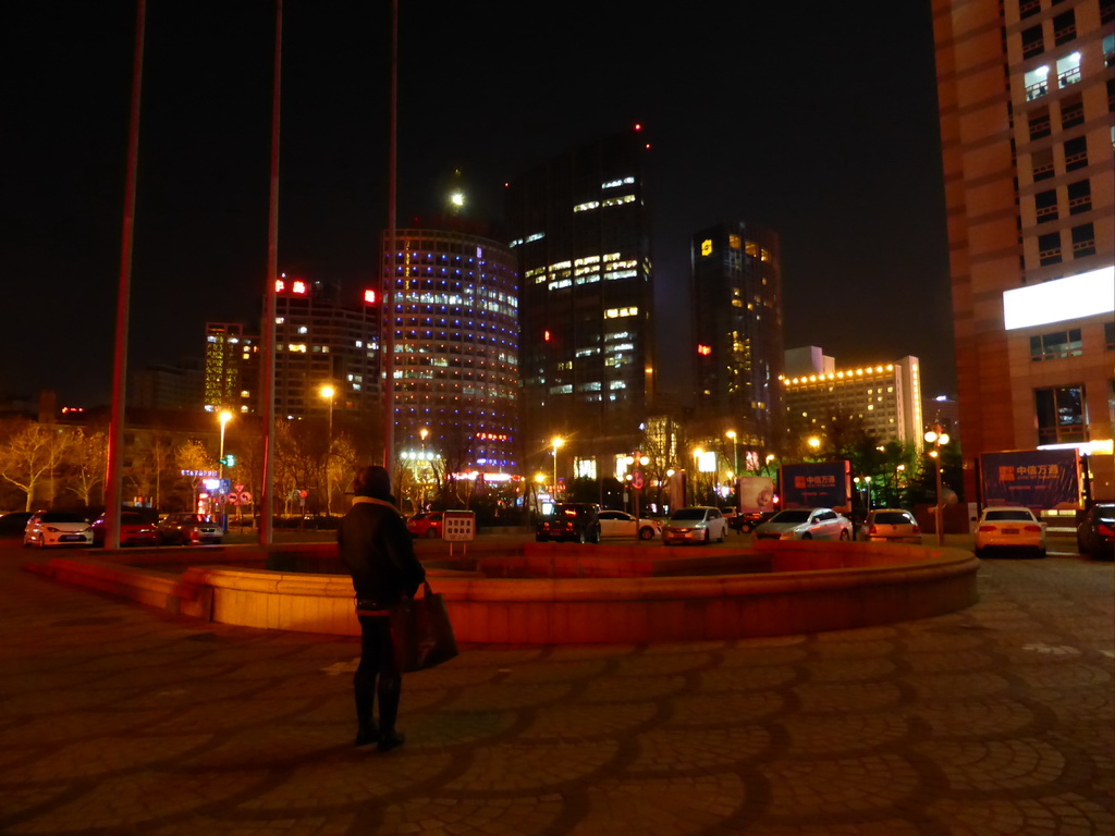 Miaomiao at the square in front of the World Trade Center, by night