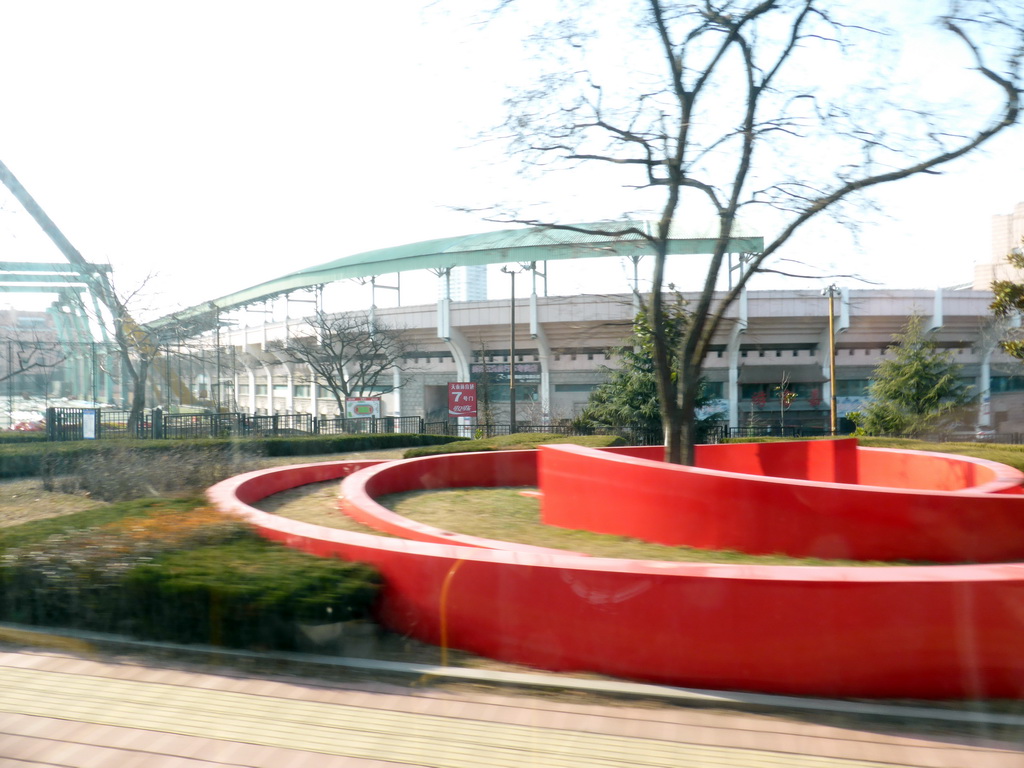 The Huiquan Square and the Qingdao Tiantai Stadium, viewed from the bus to the Badaguan Scenic Area