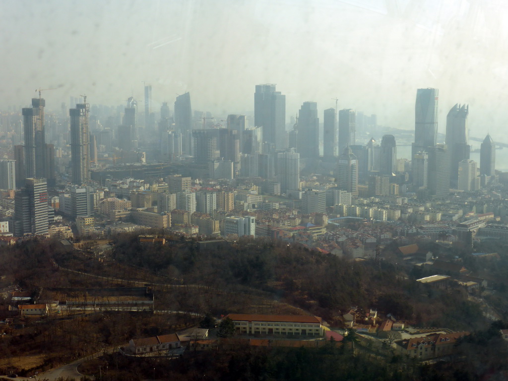 Skyscrapers at the east side of the city and the World Trade Center buildings, viewed from the highest indoor level at the Qingdao TV Tower