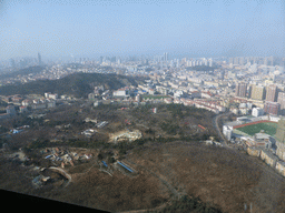 Qingdao Zongshan Park and the northwest side of the city with the Qingdaoshan Fort Site, the Guanxiangshan Park, the Zhushui Mountain and the Jiaozhou Bay, viewed from the highest indoor level at the Qingdao TV Tower