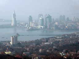 The city center, Zhan Qiao pier in Qingdao Bay and skyscrapers and dome at the west side of the city, viewed from the outdoor level at the Qingdao TV Tower