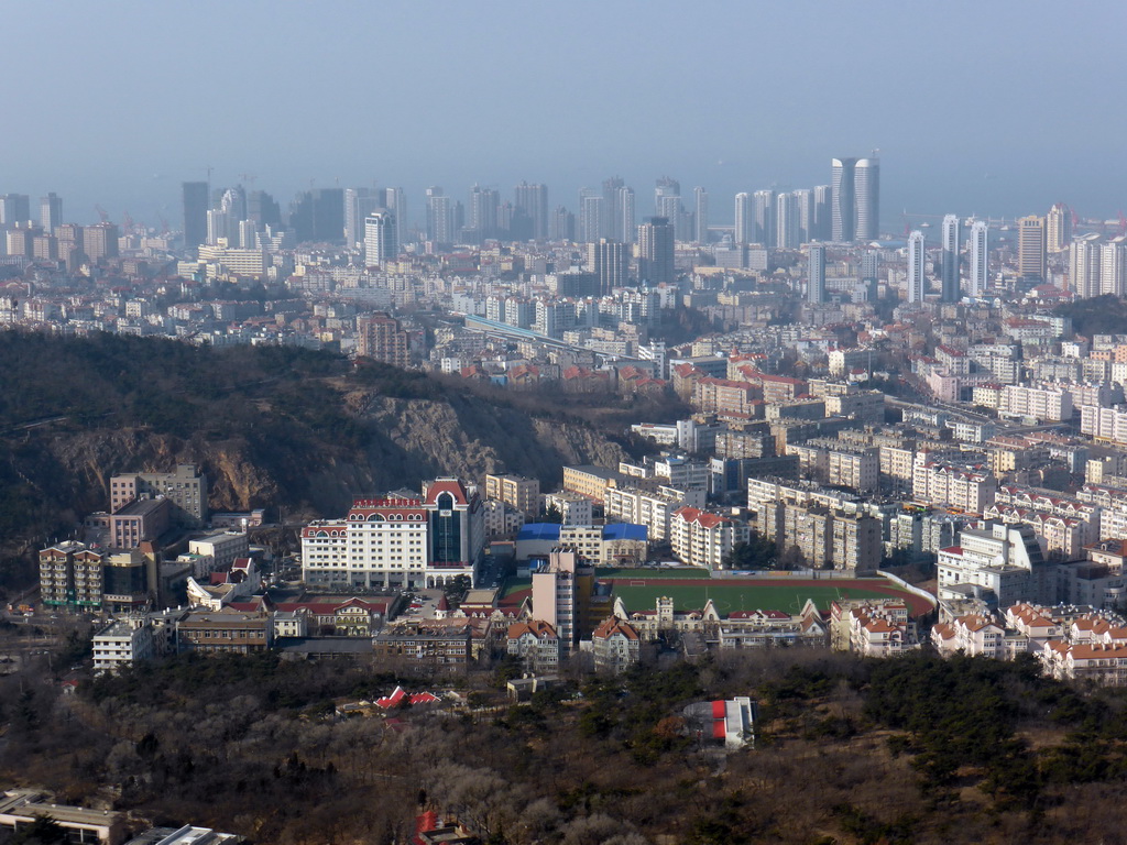 The west side of the city with the Qingdaoshan Fort Site and the Jiaozhou Bay, viewed from the outdoor level at the Qingdao TV Tower