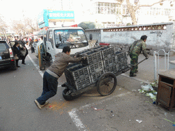 Cart being pushed at Shangqing Road