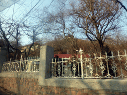 House on a hill near Wendeng Road, viewed from the taxi to the hotel