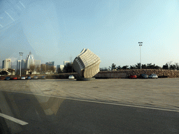 Piece of art at the north side of the Qingdao Sports Center at Tong`An Road, viewed from the taxi to the airport