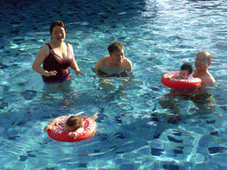 Miaomiao, Max and Miaomiao`s family at the swimming pool of the Guantang Hot Spring Resort