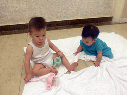Max and his cousin in the room of Miaomiao`s family at the Guantang Hot Spring Resort