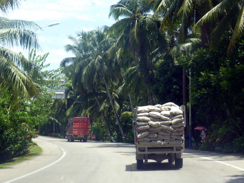 Trucks on the 223 National Road at the southwest side of the city, viewed from the car