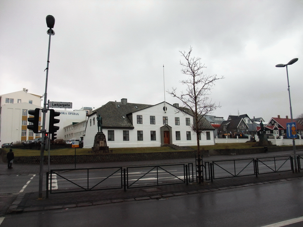 The Lækjargata street with the front of the Stjórnarráðið Government House and the statues of King Christian IX of Denmark and Hannes Hafstein