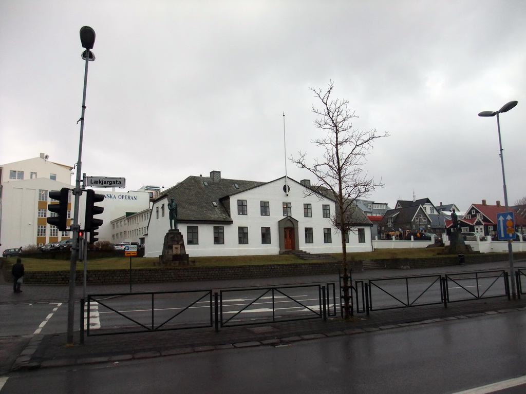 The Lækjargata street with the front of the Stjórnarráðið Government House and the statues of King Christian IX of Denmark and Hannes Hafstein