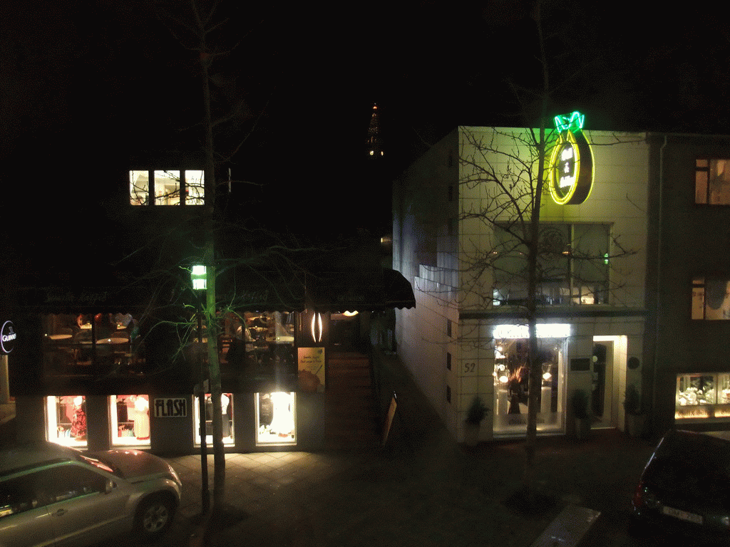 The Laugavegur street and the tower of the Hallgrímskirkja church, viewed from the Hereford Steikhús restaurant, by night