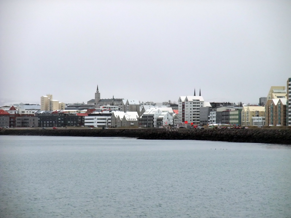 The Sculpture and Shore Walk with the sculpture `The Sun Voyager` and the towers of the Háteigskirkja church and the Tækniskólinn school, viewed from the Whale Watching Tour Boat