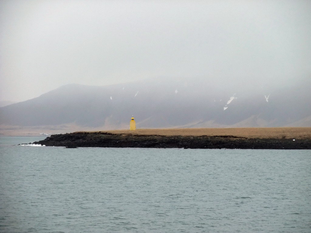 The Engey Island with its lighthouse, viewed from the Whale Watching Tour Boat
