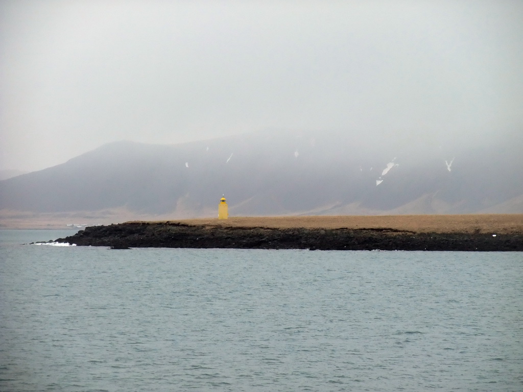 The Engey Island with its lighthouse, viewed from the Whale Watching Tour Boat