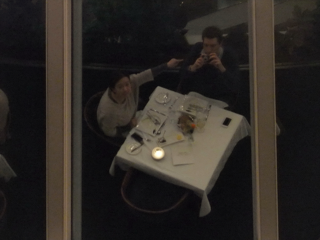 Tim and Miaomiao having dinner at the Perlan restaurant, reflected in the dome of the Perlan building