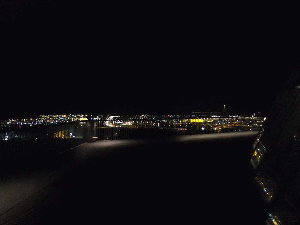 The city center with the tower of the Hallgrímskirkja church, viewed from the roof of the Perlan building, by night