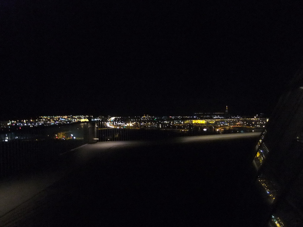 The city center with the tower of the Hallgrímskirkja church, viewed from the roof of the Perlan building, by night