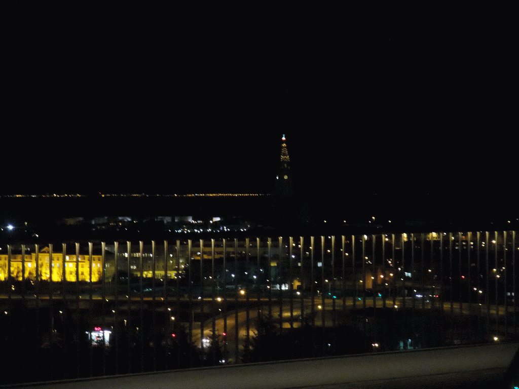 The tower of the Hallgrímskirkja church, viewed from the roof of the Perlan building, by night