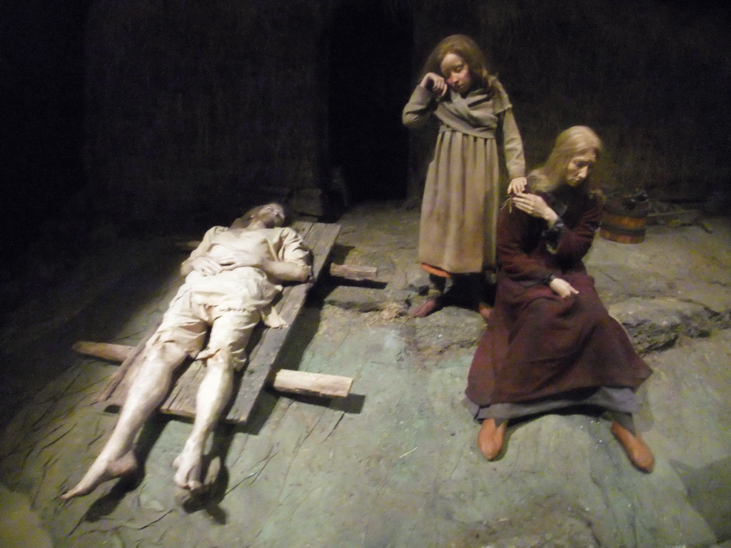 Wax statues of people dying from the plague, at the Saga Museum in the Perlan building