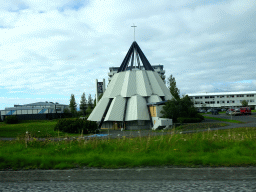 The Breiðholtskirkja at Kópavogur, viewed from the rental car on the Nýbýlavegur road