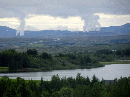 The Elliðavatn lake, the Heiðmörk park, mountains and smoke from the Hellisheiði Power Station, viewed from the balcony of our apartment at the Icelandic Apartments