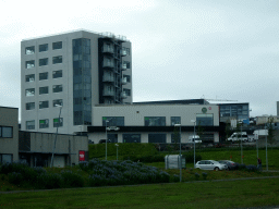 The Icelandic Apartments building, viewed from the rental car on the 413 road