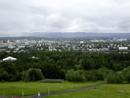 The southeast side of the city with the Kópavogskirkja church of Kópavogur, viewed from the roof of the Perlan building