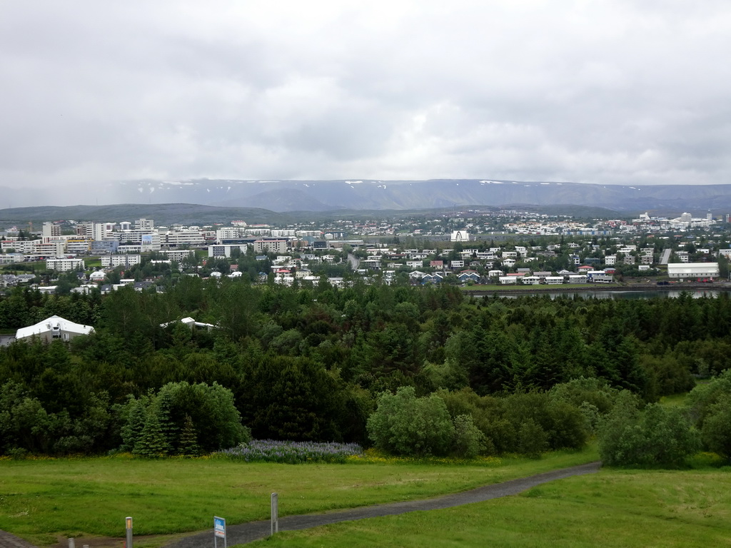 The southeast side of the city with the Kópavogskirkja church of Kópavogur, viewed from the roof of the Perlan building