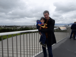 Tim and Max on the roof of the Perlan building, with a view on the city center with the Hallgrímskirkja church