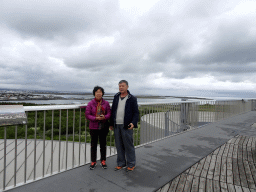 Miaomiao`s parents on the roof of the Perlan building, with a view on the city center