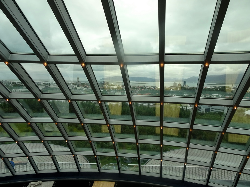 The dome of the Perlan building with a view on the city center with the Hallgrímskirkja church, the Höfðatorg business center and the Háteigskirkja church, viewed from the Sixth Floor