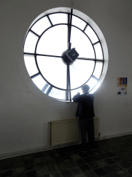 Miaomiao`s father at the clock in the tower of the Hallgrímskirkja church