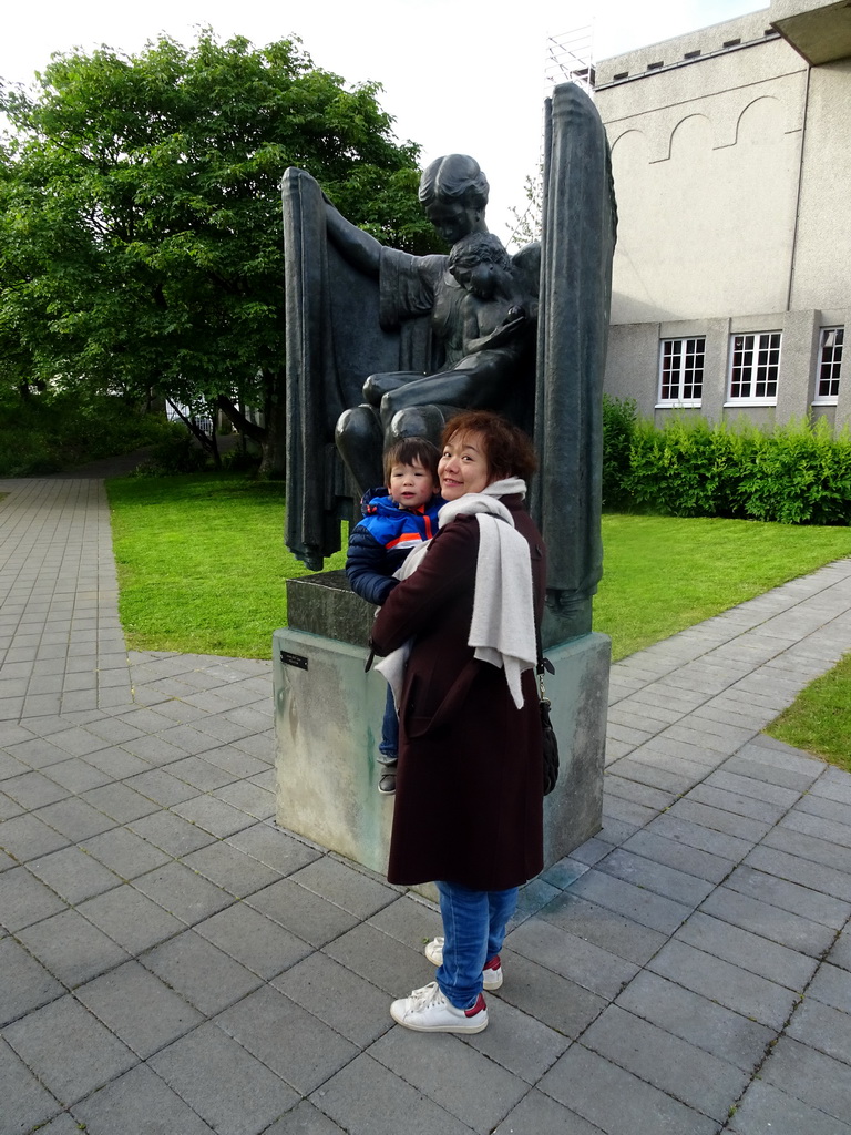 Miaomiao and Max with the sculpture `Protection` at the Einar Jónsson Sculpture Garden, with explanation