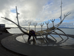 Max and Miaomiao`s parents at the sculpture `The Sun Voyager` at the Sculpture and Shore Walk