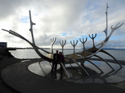 Miaomiao`s parents at the sculpture `The Sun Voyager` at the Sculpture and Shore Walk