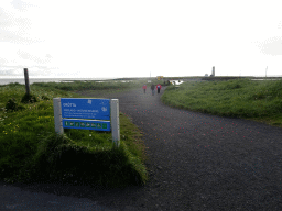 Sign in front of the Grótta Island with the Grótta Island Lighthouse