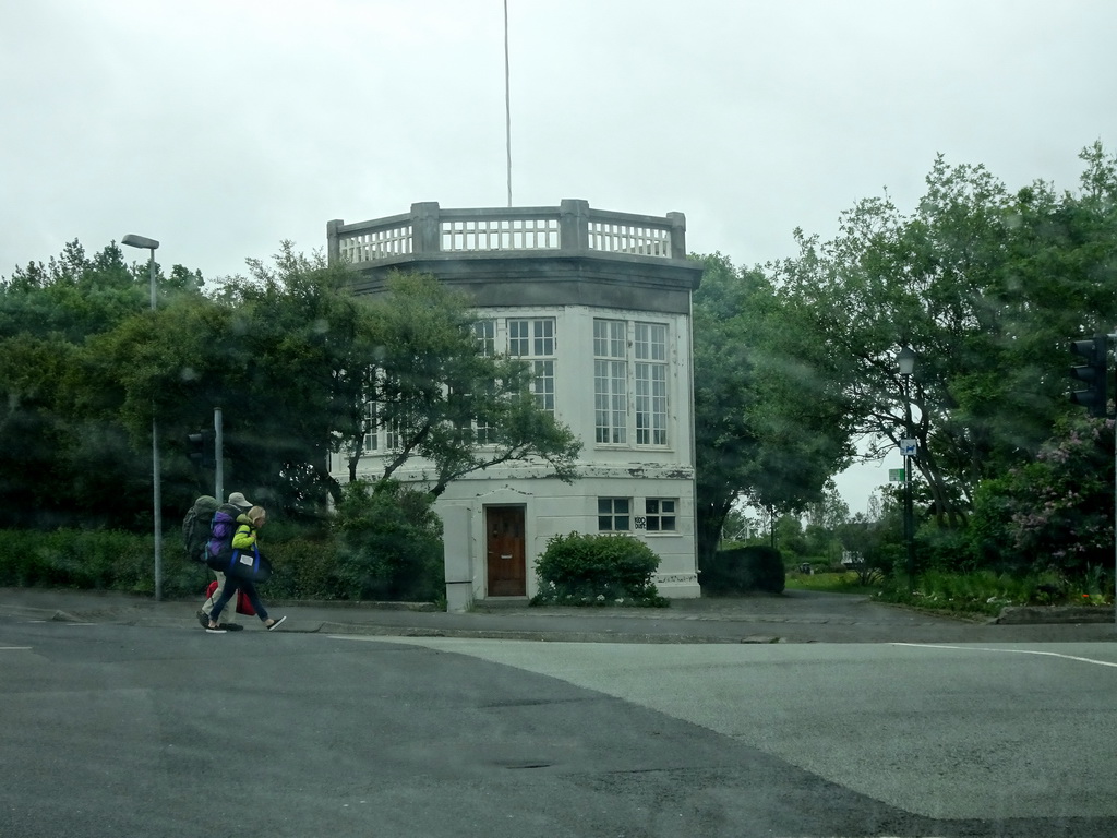 Building at the northeast side of the Hljómskálagarður park, viewed from the rental car on the Fríkirkjuvegur street