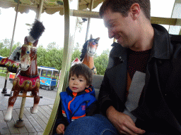 Tim and Max in the Carousel at the Húsdýragarðurinn zoo