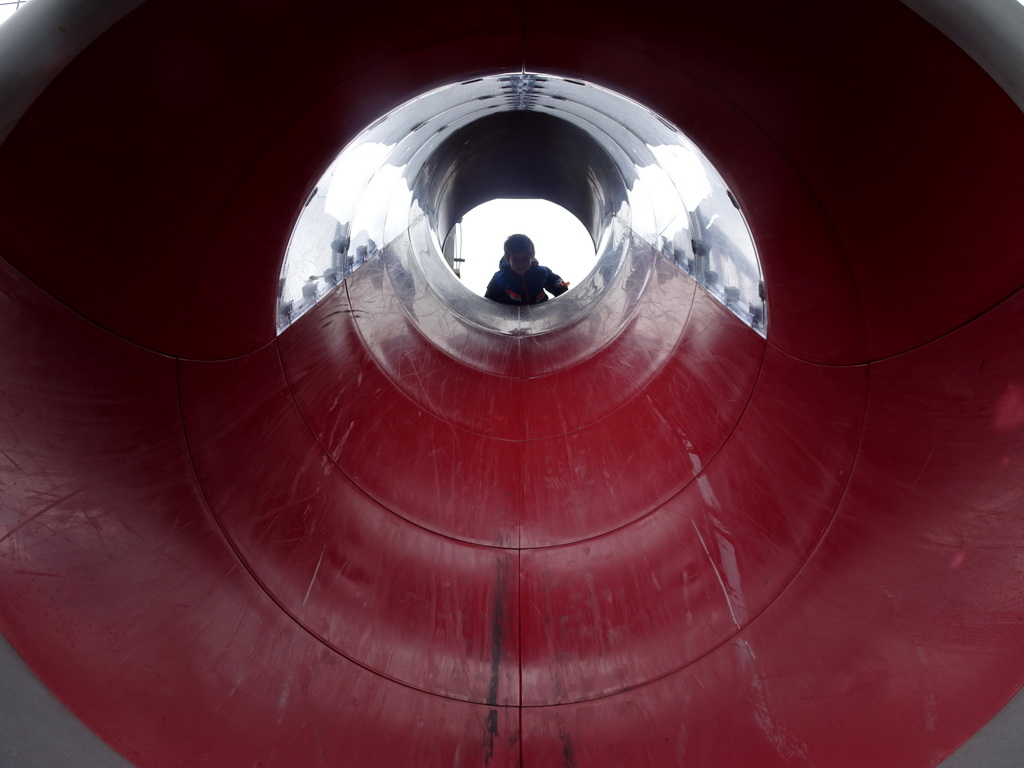 Max at the slide at the playground at the Fjölskyldugarðurinn park