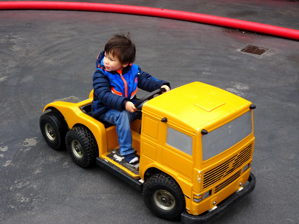 Max in a bumper truck at the Fjölskyldugarðurinn park