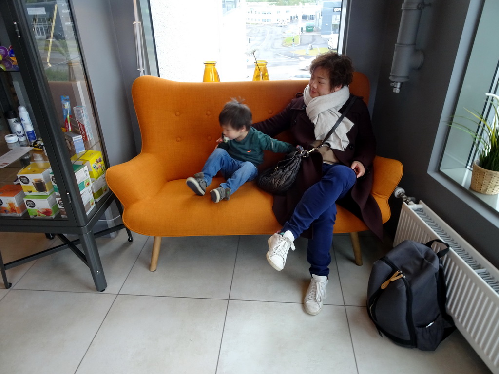 Miaomiao and Max in the lobby of the Icelandic Apartments at Kópavogur